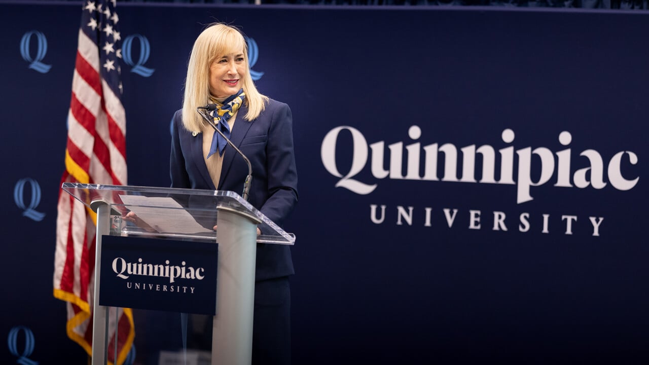 Incoming President Hardin speaks at a podium